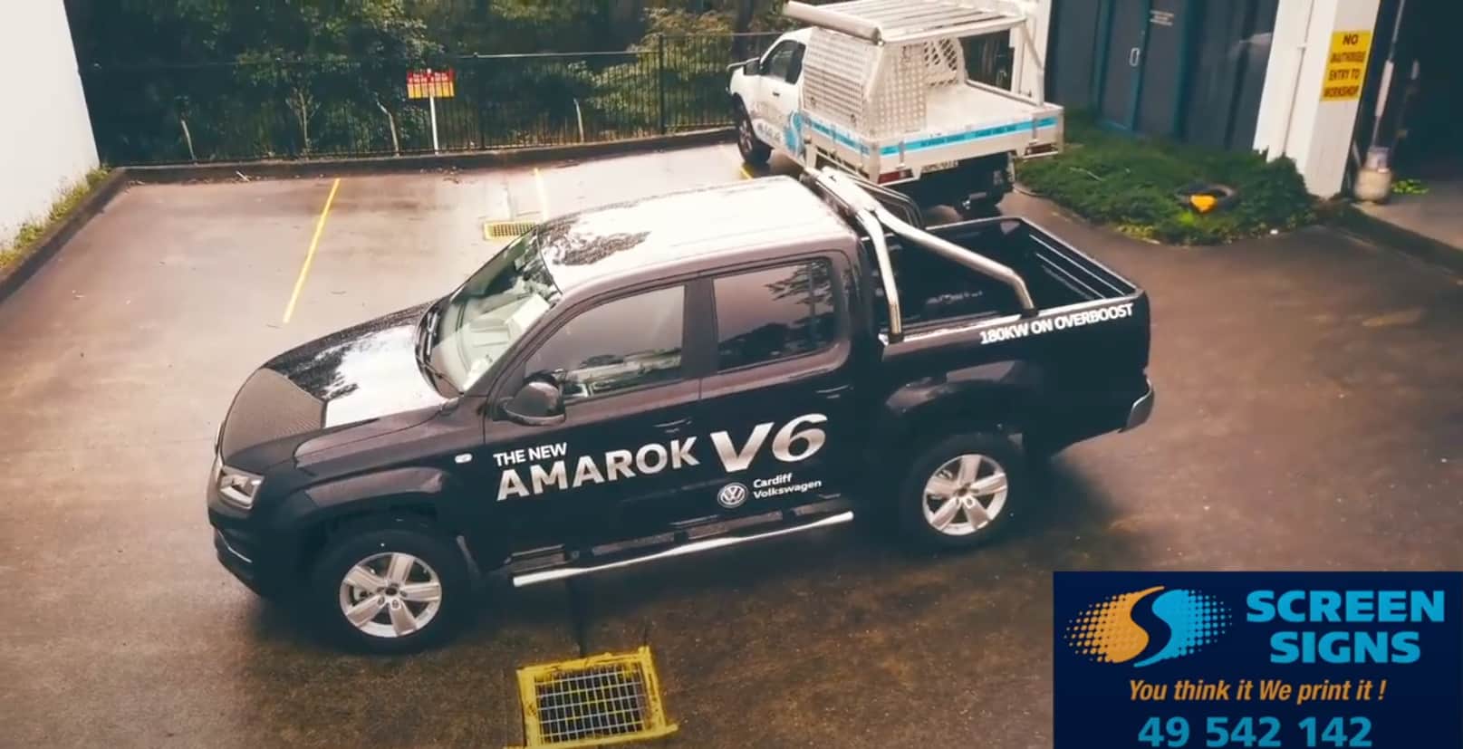 Amarok V6 getting ute tray signage in Cardiff NSW by Screen Signs