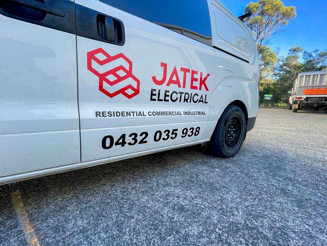 sign writing cardiff newcastle Vinyl cut vehicle signage design & installation in Cardiff JATEK ELECTRICAL VINYL CUT VAN SIDE