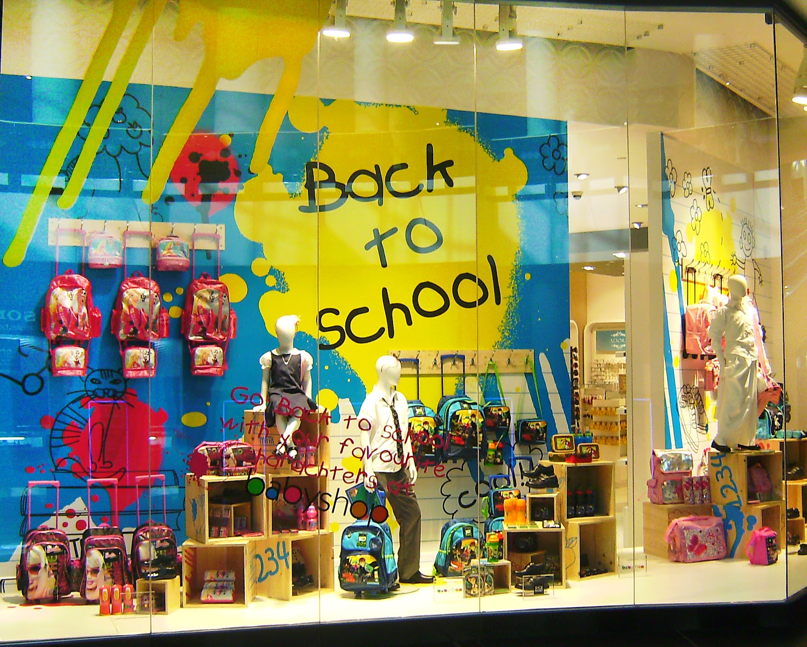 Back to school signs with window display in a retail store